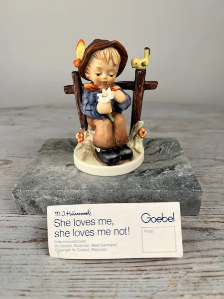 M.J Hummel Goebel She loves me, she loves me not!