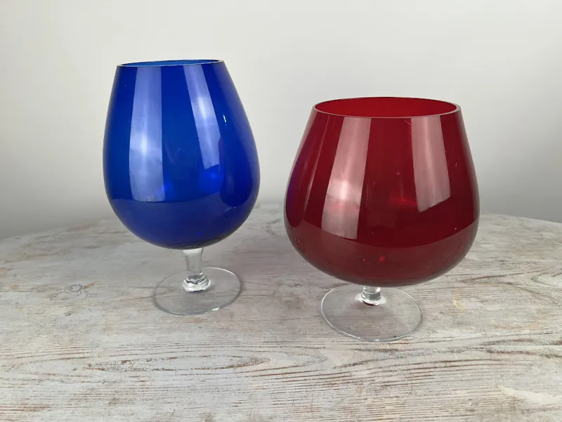 två större ljuslyktor i glas