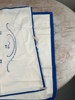 Handbroderad bonad 